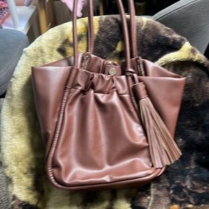Brown purse with tassel